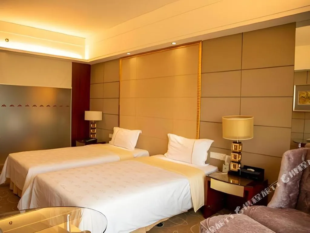 Bed in Wellton International Hotel