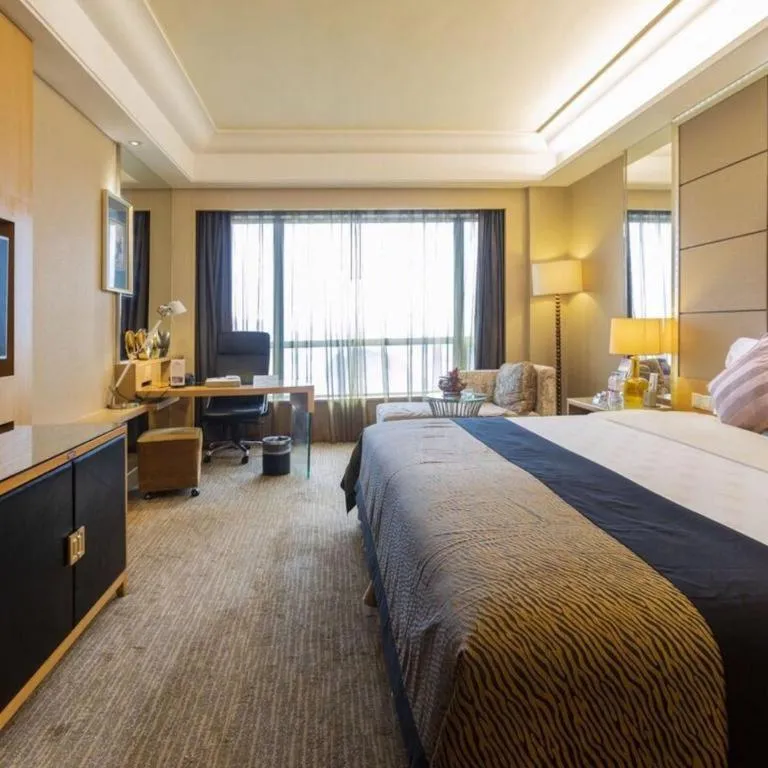 Bed in Wellton International Hotel