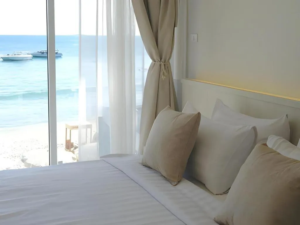 Bed in Sawasdee Coco Resort