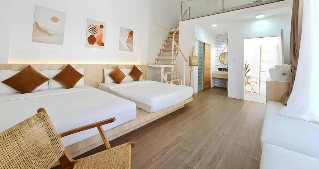 Bed in Sawasdee Coco Resort