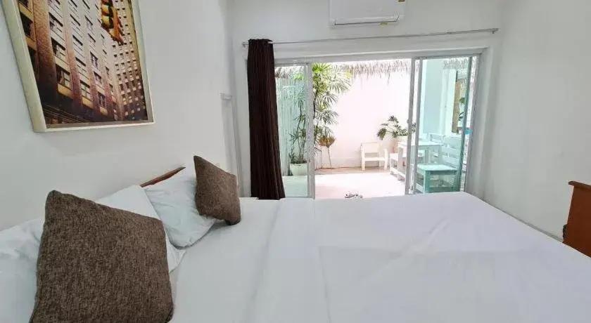 Bed in Sawasdee Coco Resort Bed in Sawasdee Coco Resort