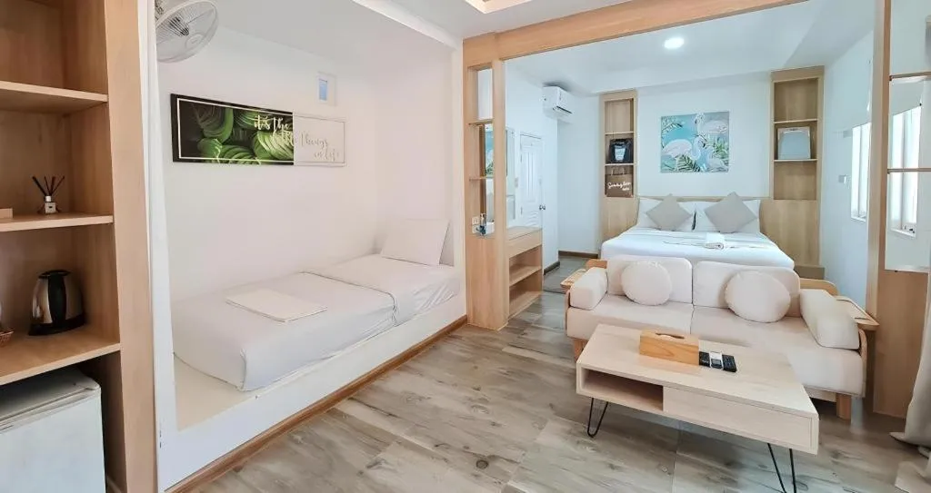 Bed in Sawasdee Coco Resort