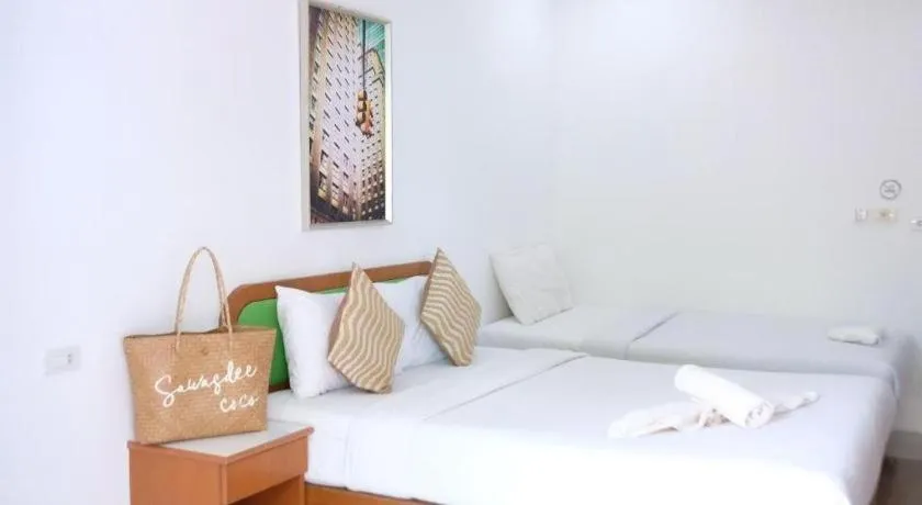 Bed in Sawasdee Coco Resort