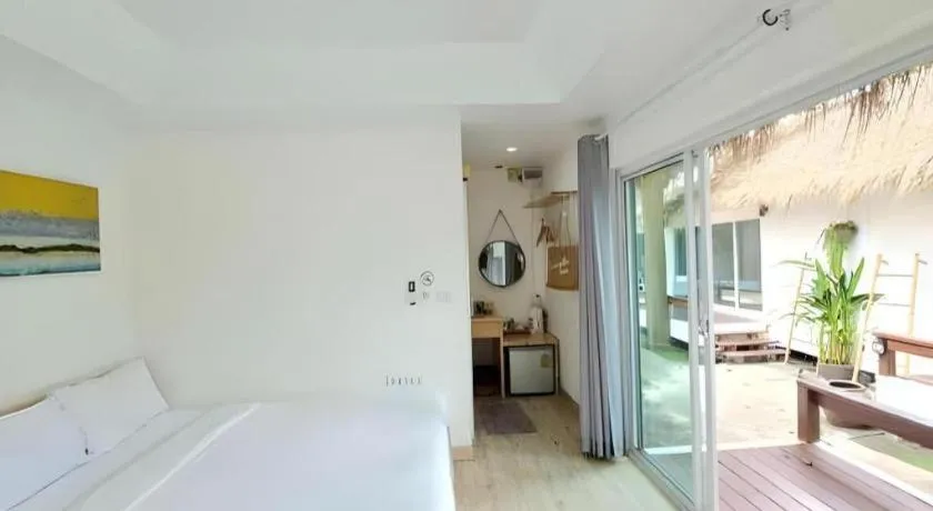 Bed in Sawasdee Coco Resort