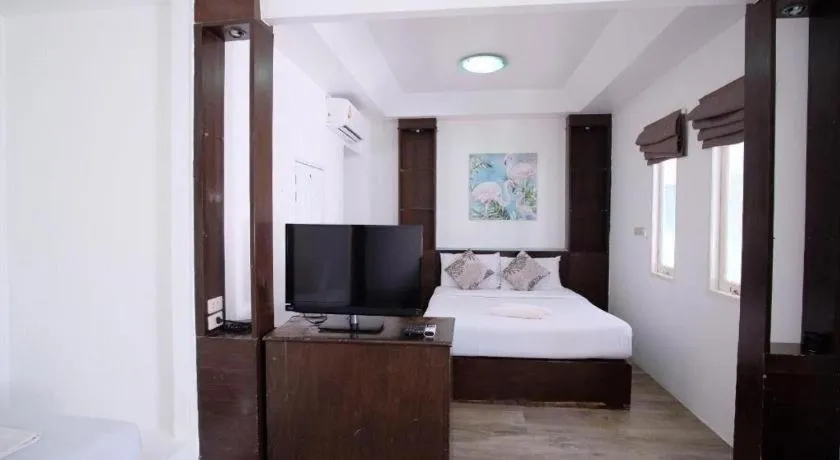 Bed in Sawasdee Coco Resort