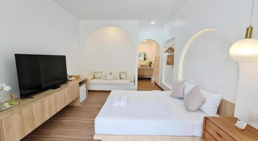 Bed in Sawasdee Coco Resort