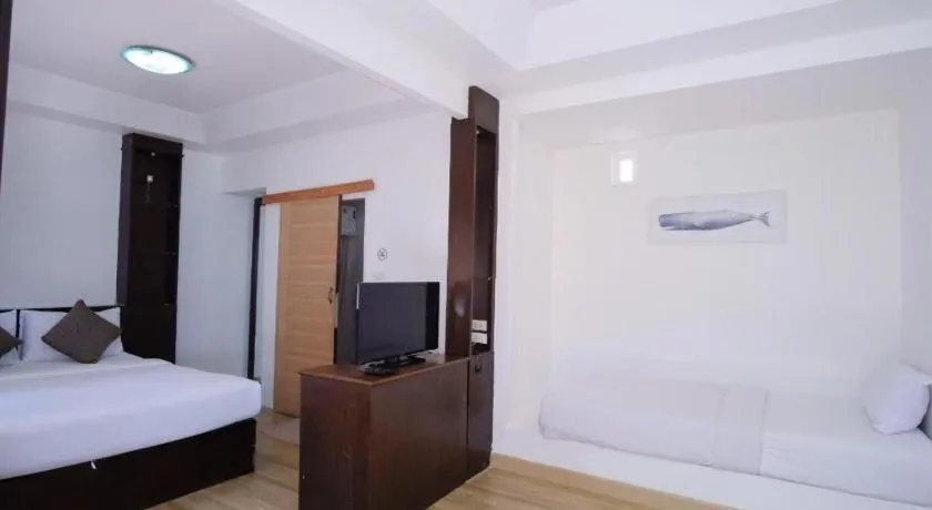 Bed in Sawasdee Coco Resort