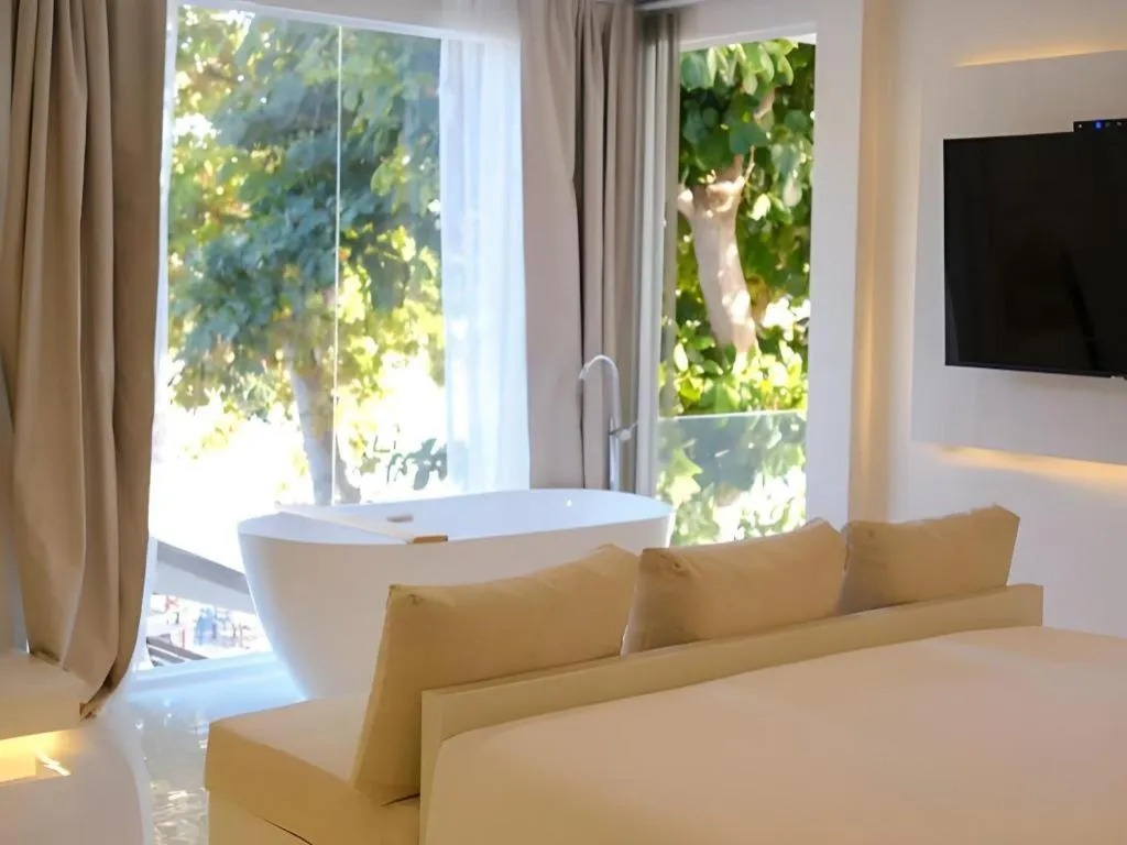 Bed in Sawasdee Coco Resort