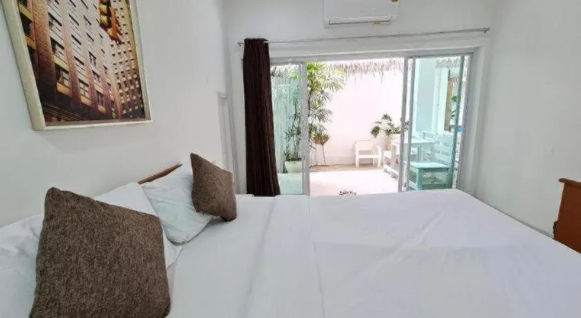 Bed in Sawasdee Coco Resort