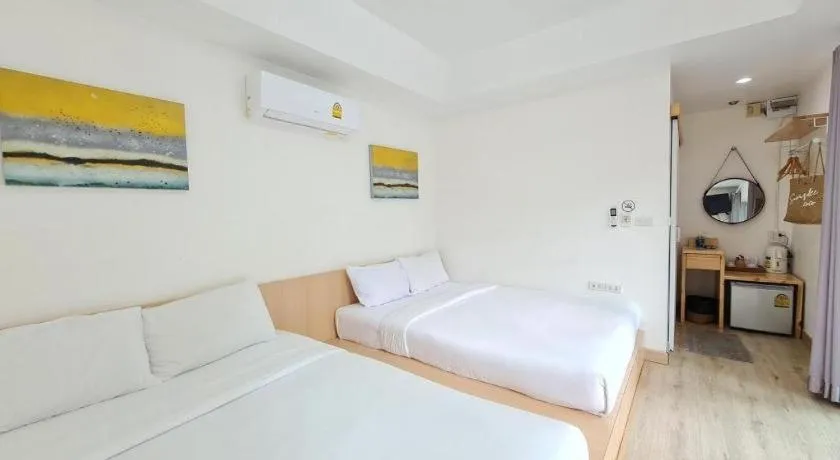 Bed in Sawasdee Coco Resort