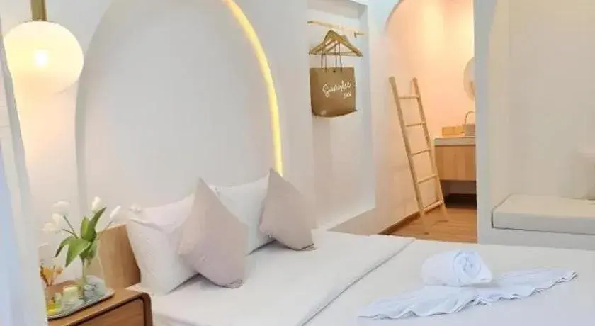 Bed in Sawasdee Coco Resort Bed in Sawasdee Coco Resort