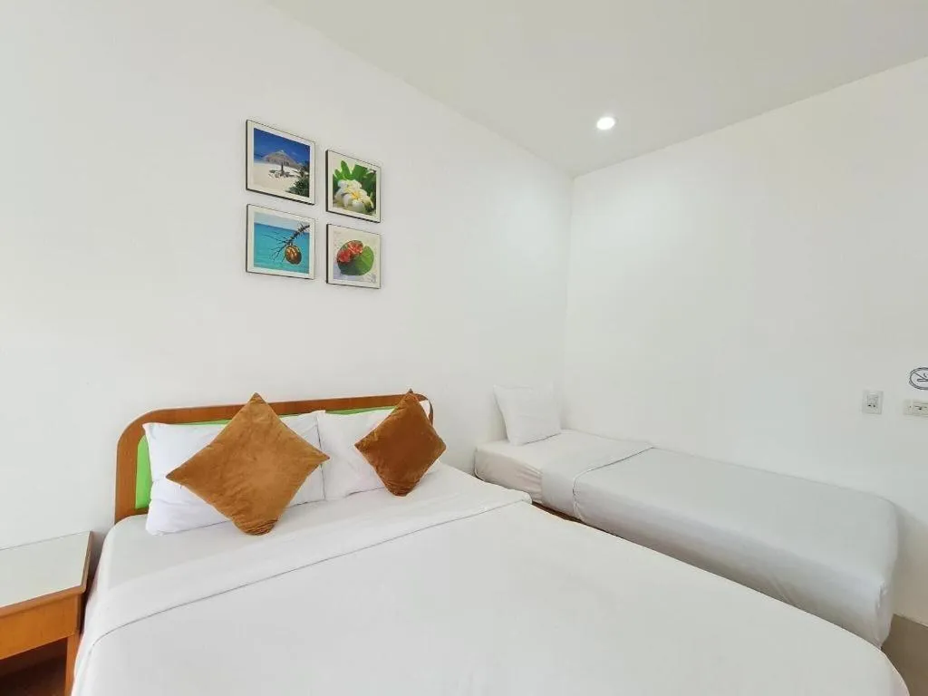 Bed in Sawasdee Coco Resort