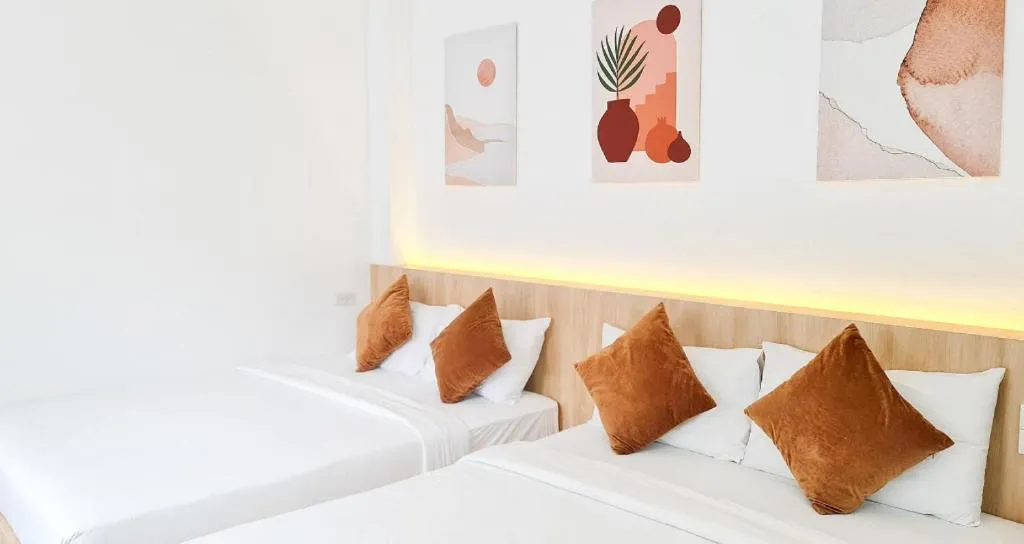 Bed in Sawasdee Coco Resort