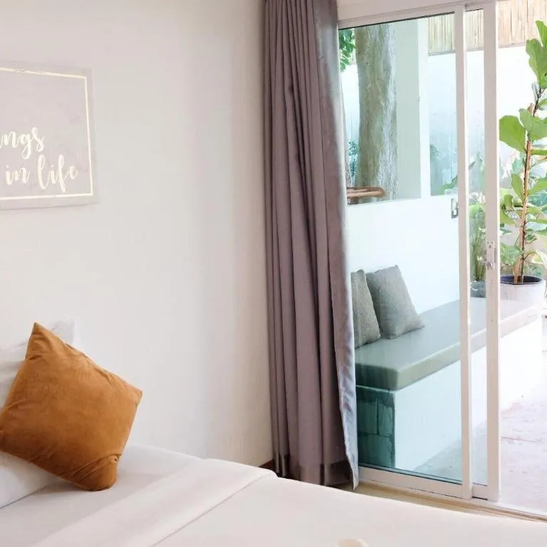 Bed in Sawasdee Coco Resort