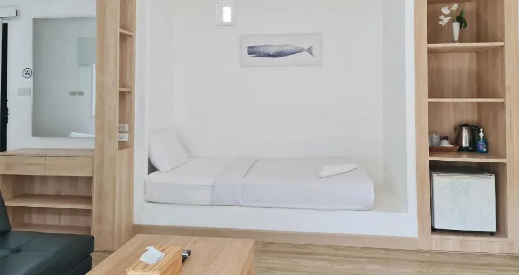 Bed in Sawasdee Coco Resort