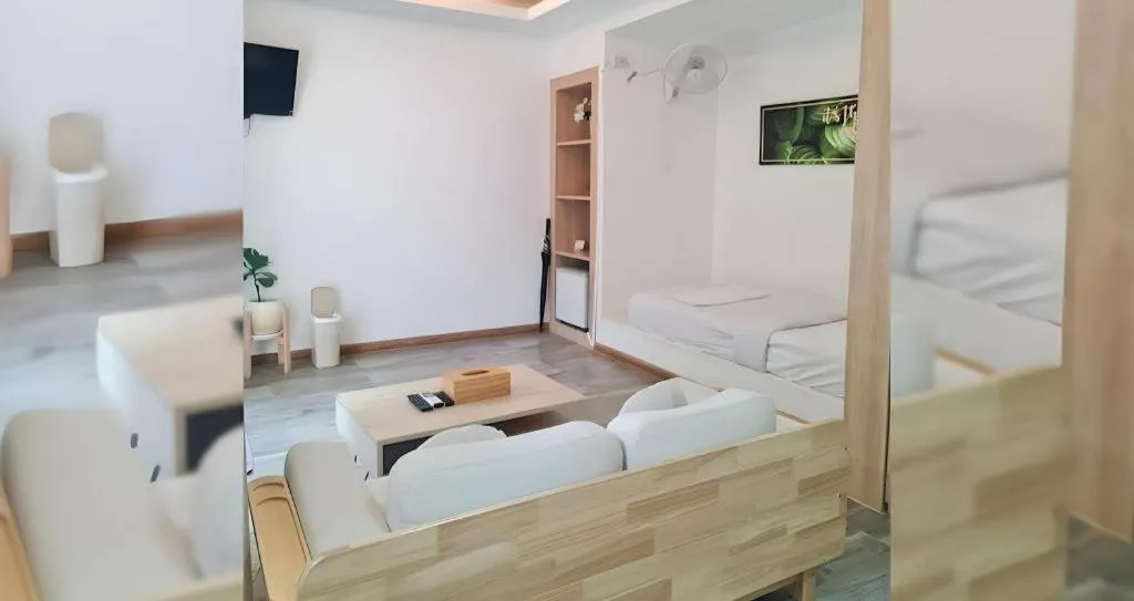 Bed in Sawasdee Coco Resort