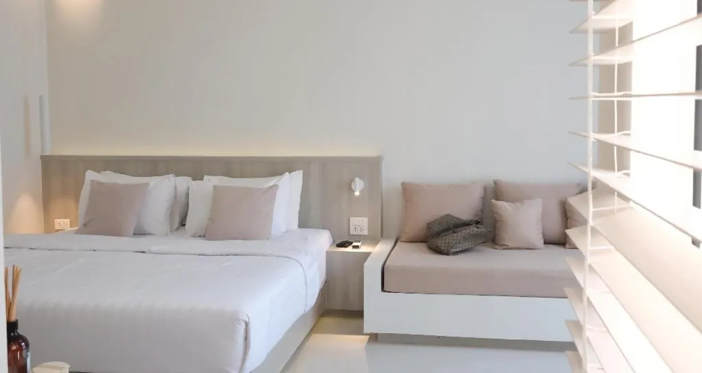 Bed in Sawasdee Coco Resort