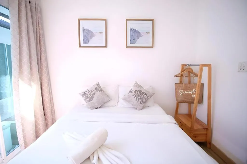 Bed in Sawasdee Coco Resort