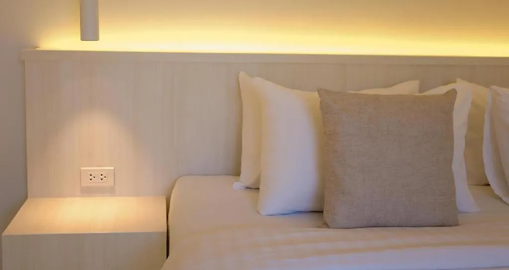 Bed in Sawasdee Coco Resort