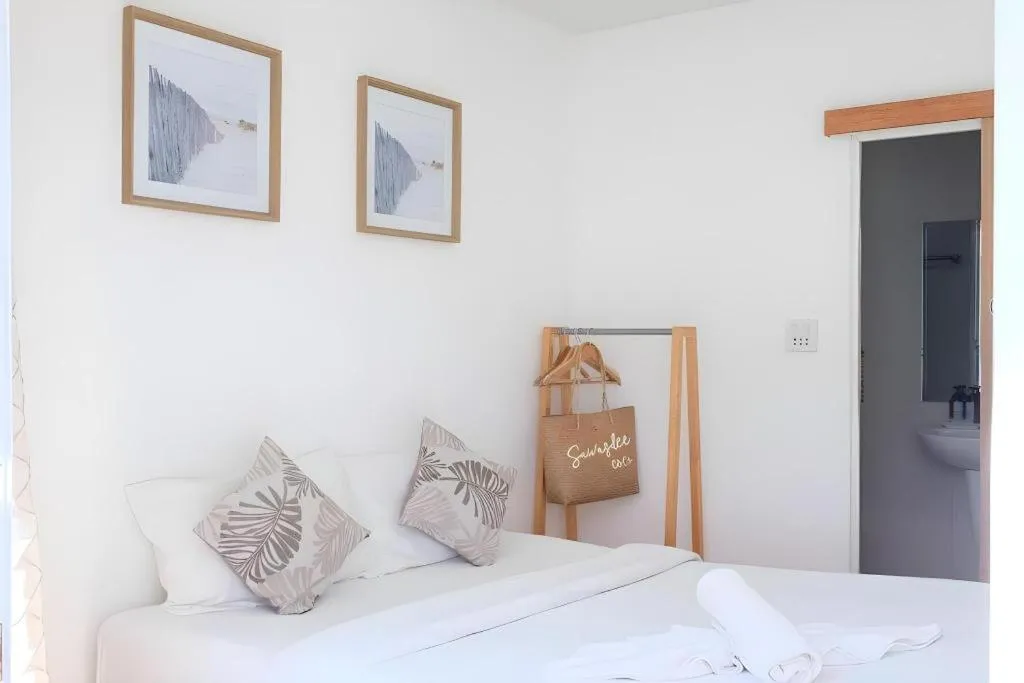 Bed in Sawasdee Coco Resort