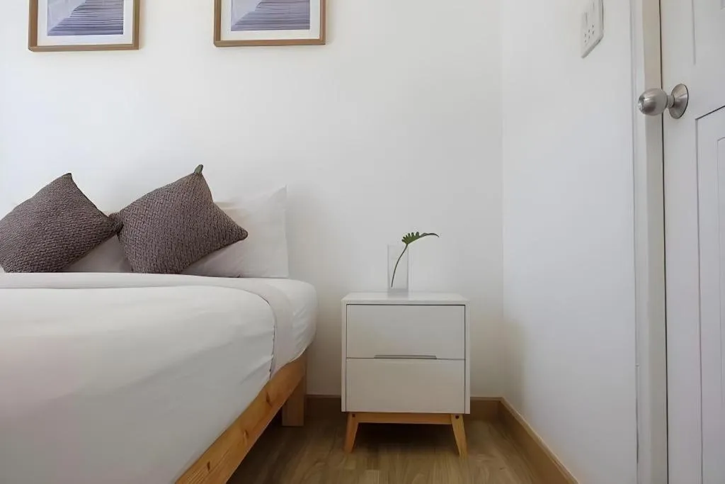 Bed in Sawasdee Coco Resort