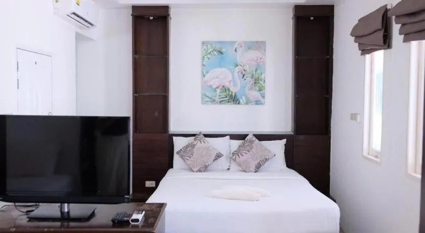 Bed in Sawasdee Coco Resort