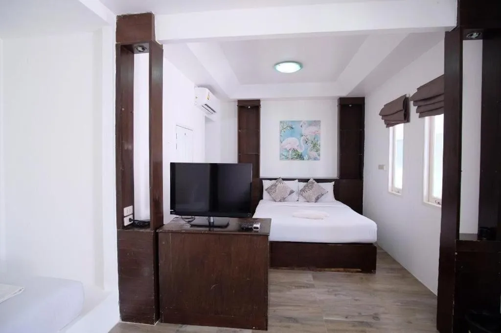 Bed in Sawasdee Coco Resort