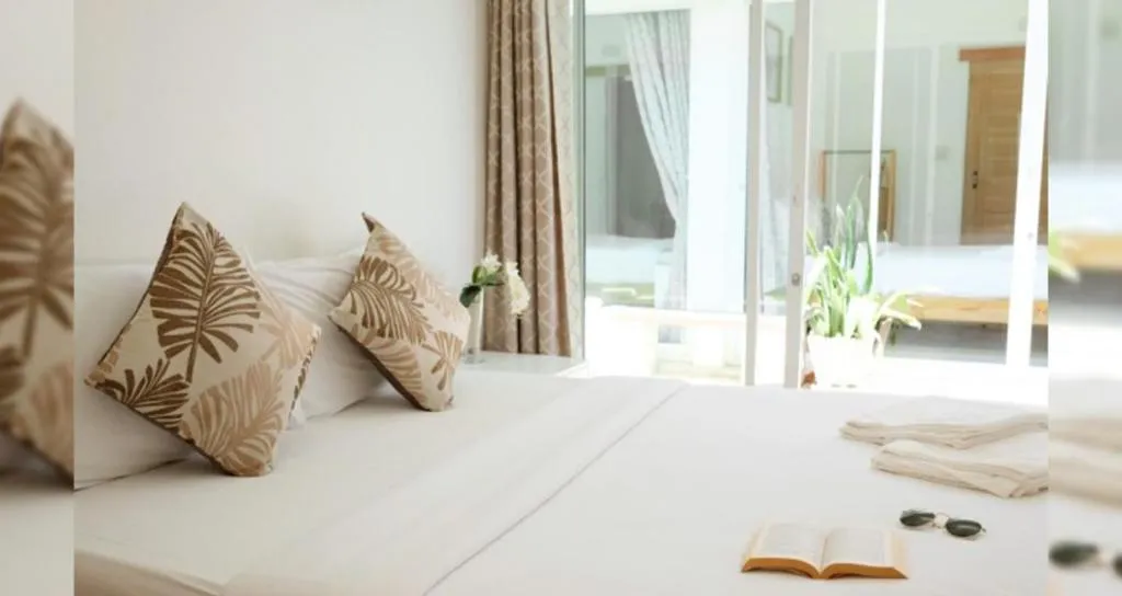 Bed in Sawasdee Coco Resort