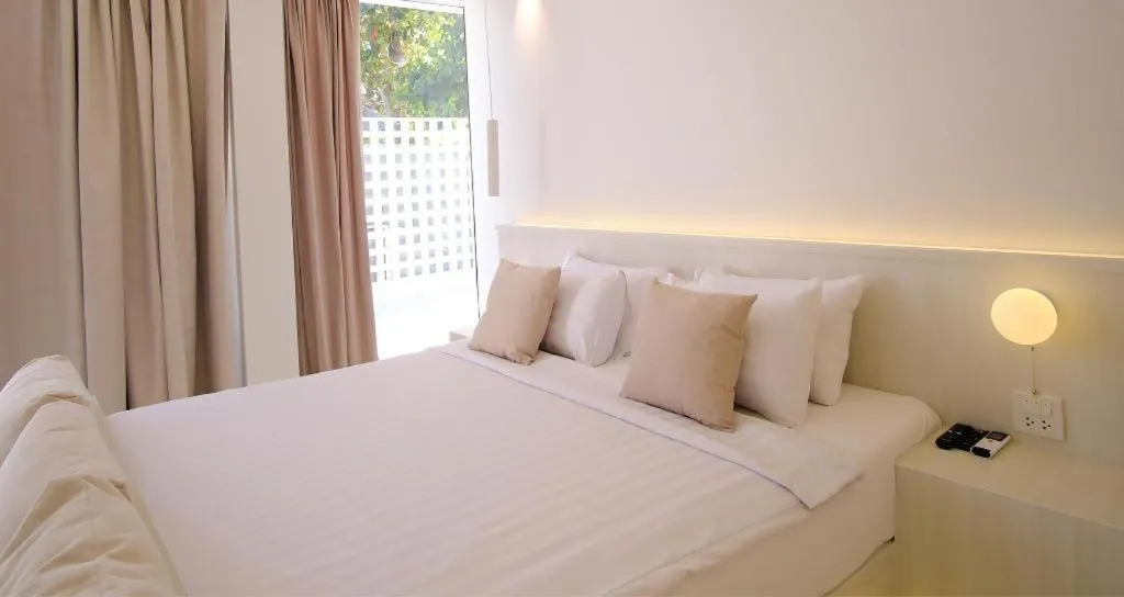 Bed in Sawasdee Coco Resort