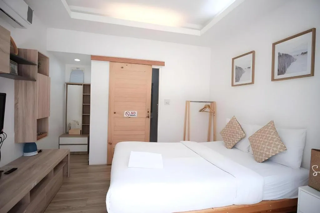 Bed in Sawasdee Coco Resort