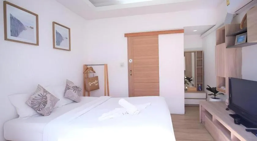 Bed in Sawasdee Coco Resort