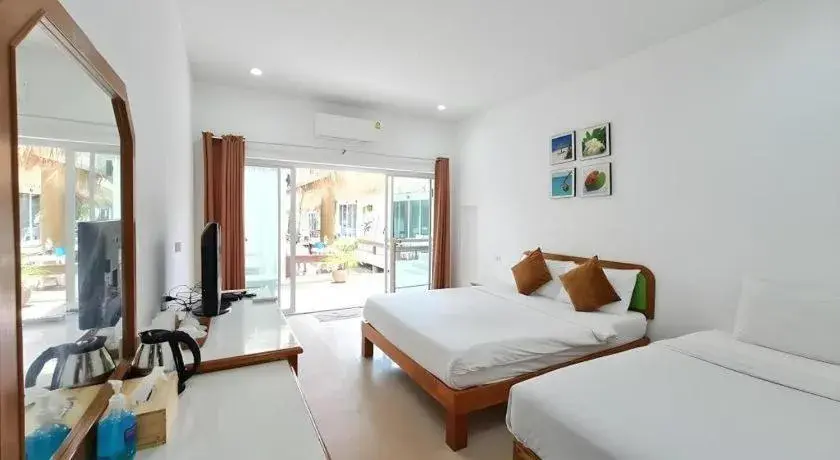 Bed in Sawasdee Coco Resort Bed in Sawasdee Coco Resort