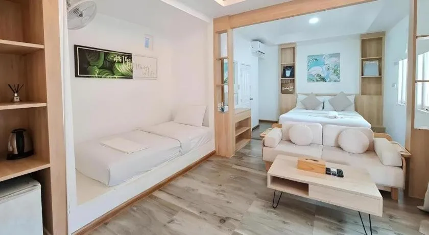 Bed in Sawasdee Coco Resort