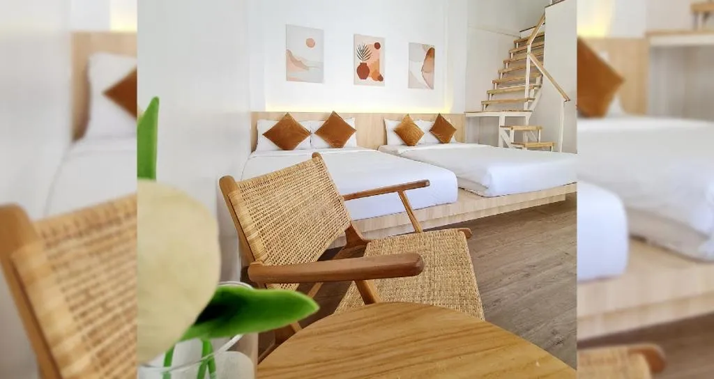 Bed in Sawasdee Coco Resort