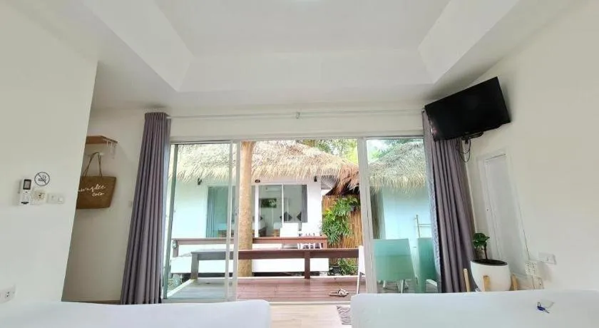 Bed in Sawasdee Coco Resort