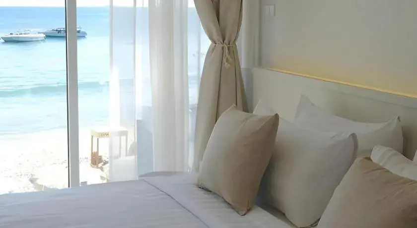 Bed in Sawasdee Coco Resort Bed in Sawasdee Coco Resort