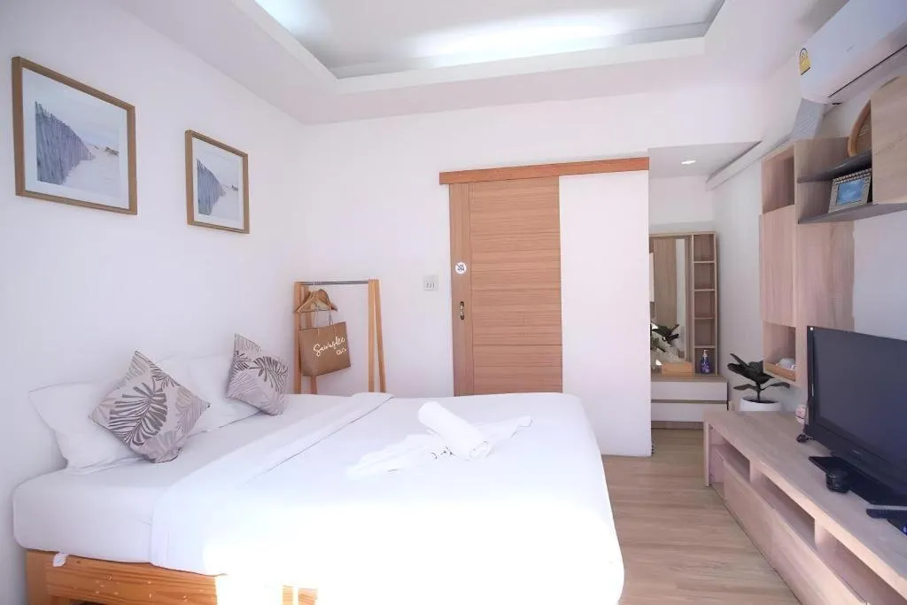 Bed in Sawasdee Coco Resort