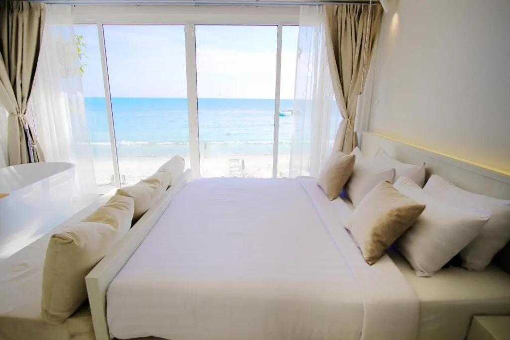 Bed in Sawasdee Coco Resort