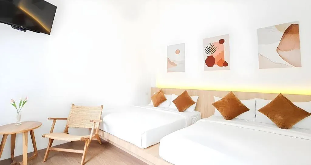 Bed in Sawasdee Coco Resort