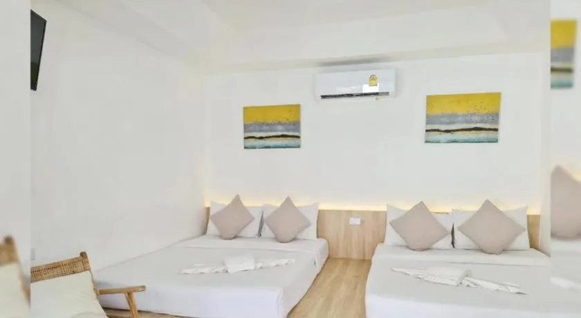 Bed in Sawasdee Coco Resort