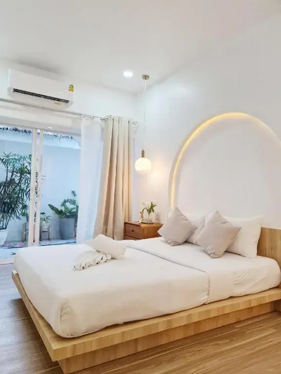 Bed in Sawasdee Coco Resort Bed in Sawasdee Coco Resort