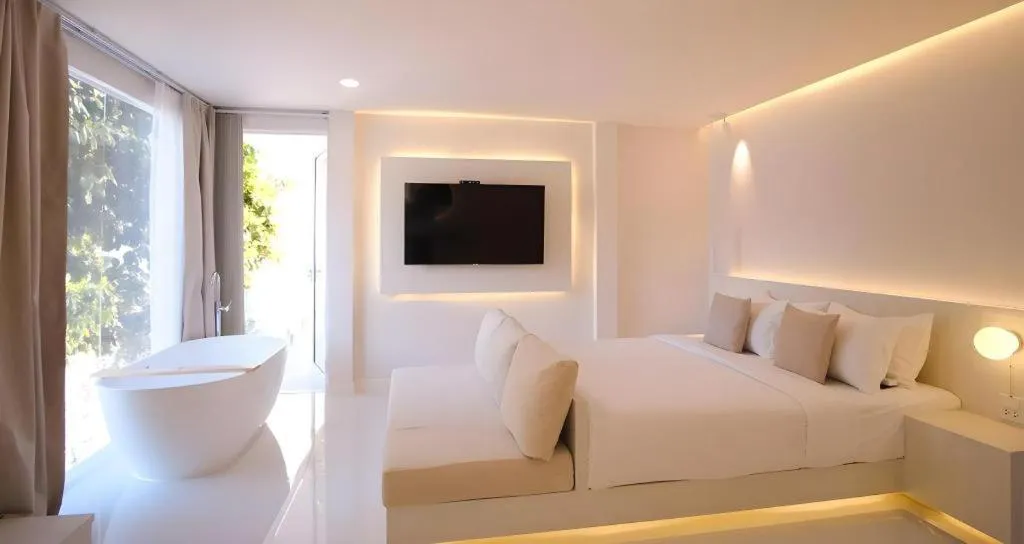 Bed in Sawasdee Coco Resort