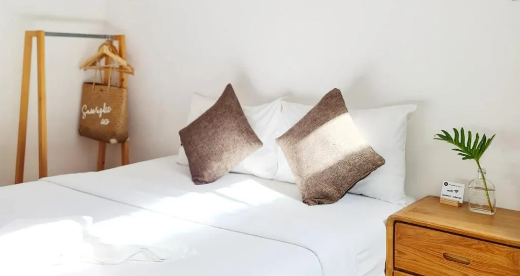 Bed in Sawasdee Coco Resort