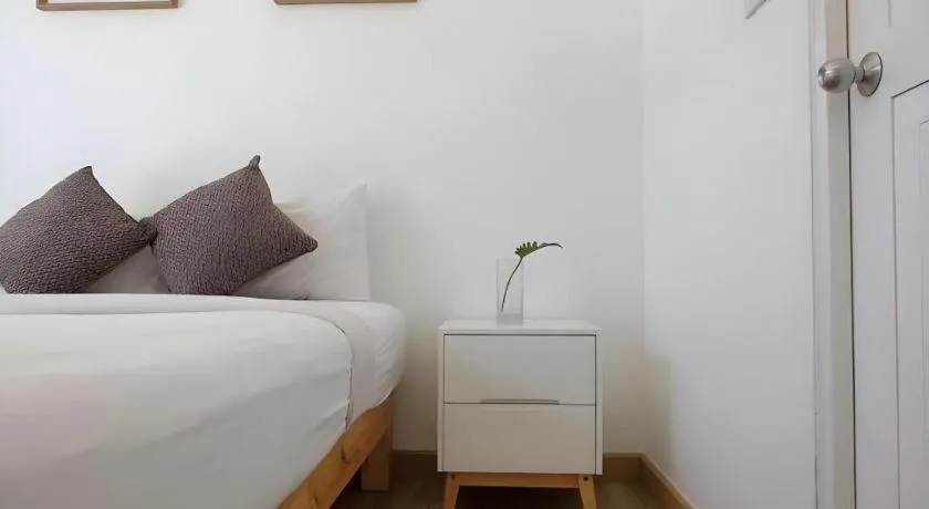 Bed in Sawasdee Coco Resort