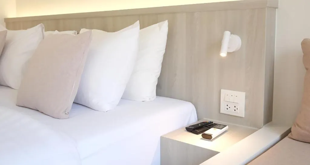 Bed in Sawasdee Coco Resort