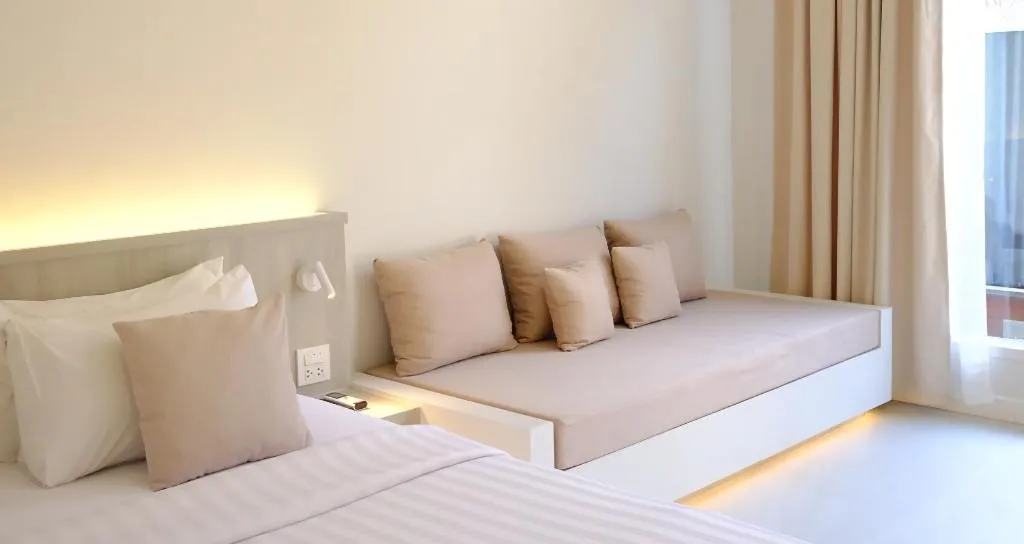 Bed in Sawasdee Coco Resort