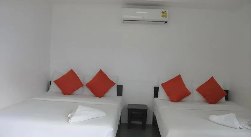 Bed in Sawasdee Coco Resort