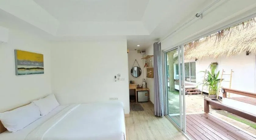 Bed in Sawasdee Coco Resort