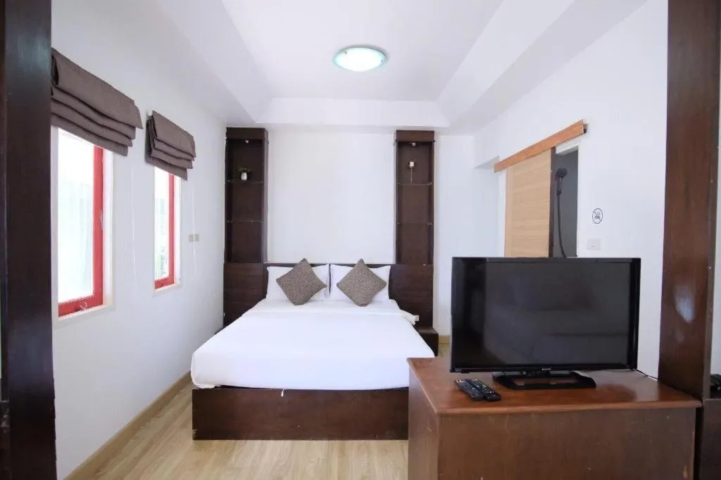 Bed in Sawasdee Coco Resort