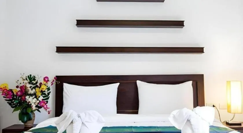 Bed in Triple Rund Place Hotel